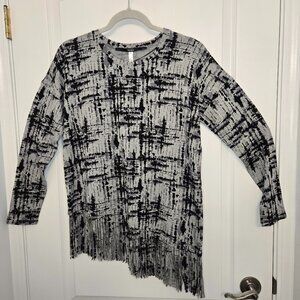 Kenzie Grey and black patterned long sleeve Asymmetrical fringed hemline